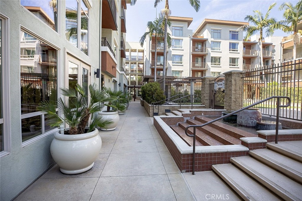 100 South Alameda Street, Unit 353 Los Angeles, CA 90012 - Photo 33 of 60 a view of a patio with couches and potted plants