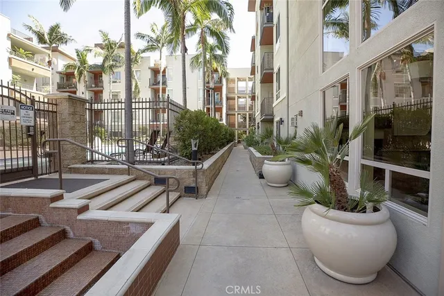 a view of a building with a yard