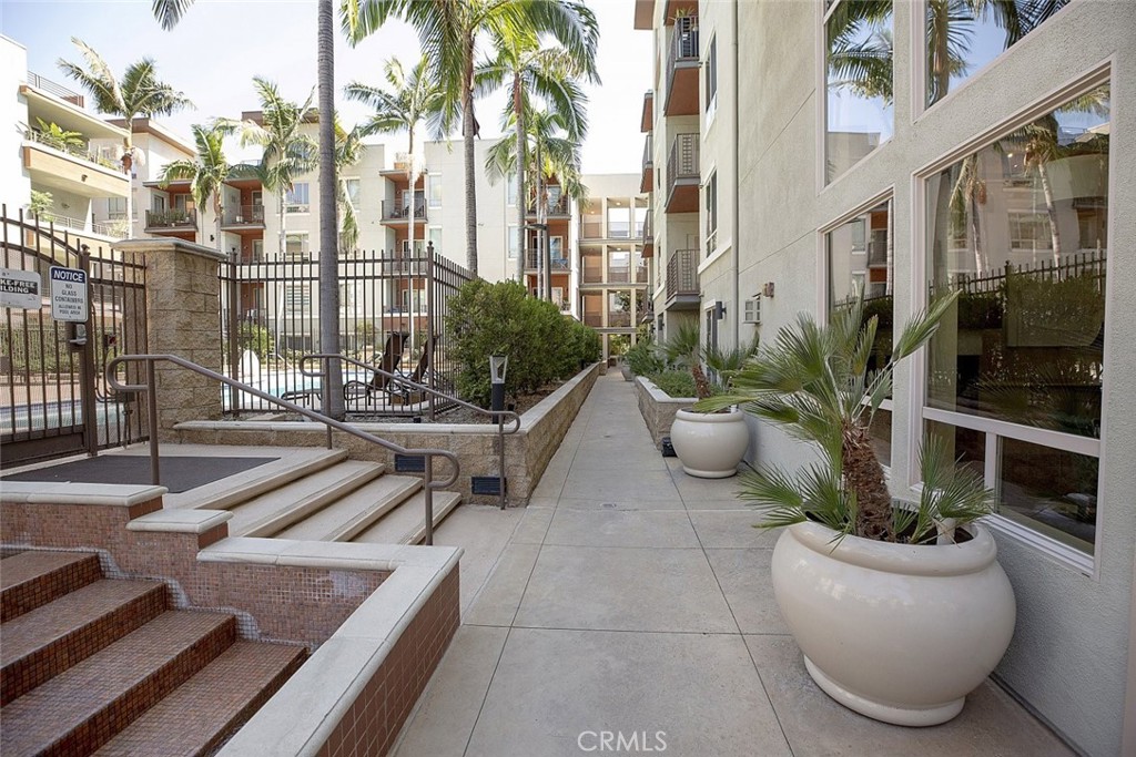 100 South Alameda Street, Unit 353 Los Angeles, CA 90012 - Photo 36 of 60 a view of a patio with couches and potted plants