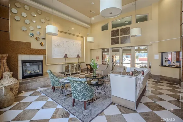 a room with a large mirror and glass door