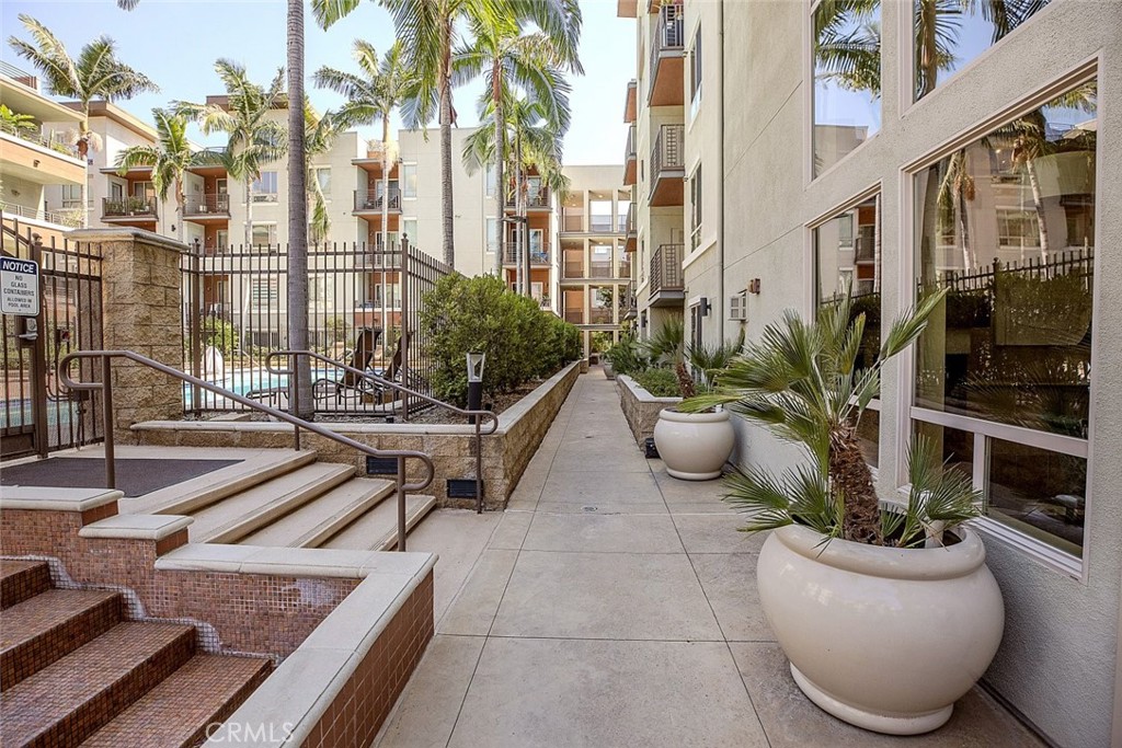 100 South Alameda Street, Unit 353 Los Angeles, CA 90012 - Photo 40 of 60 a view of a patio with couches and potted plants