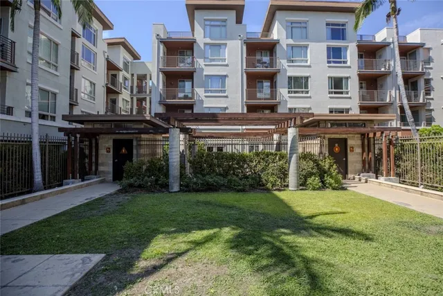 a living room with furniture window and a flat screen tv
