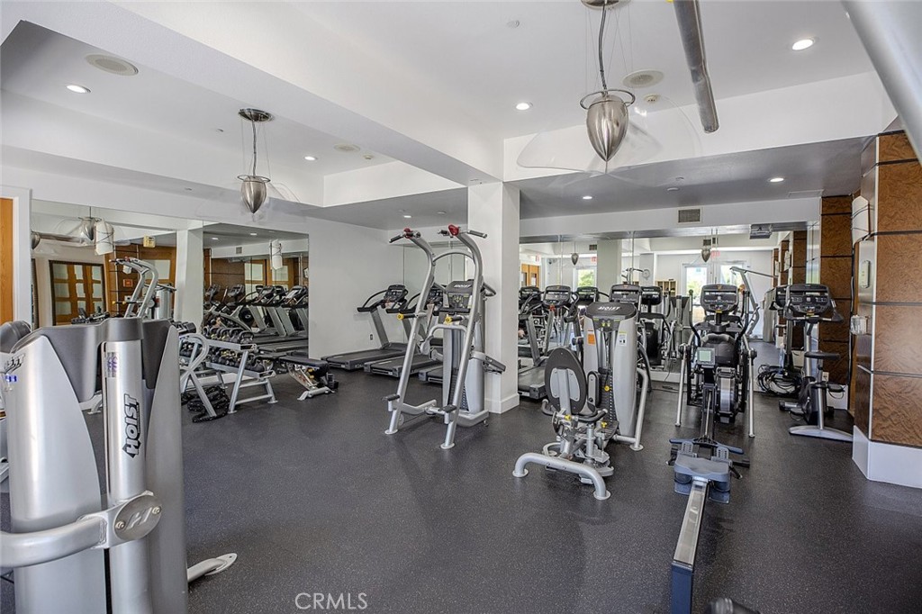 100 South Alameda Street, Unit 353 Los Angeles, CA 90012 - Photo 45 of 60 a view of a room with gym equipment