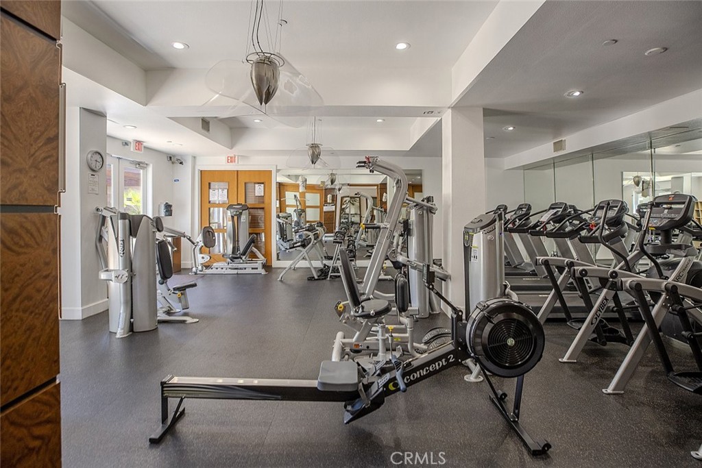 100 South Alameda Street, Unit 353 Los Angeles, CA 90012 - Photo 48 of 60 a view of a room with gym equipment
