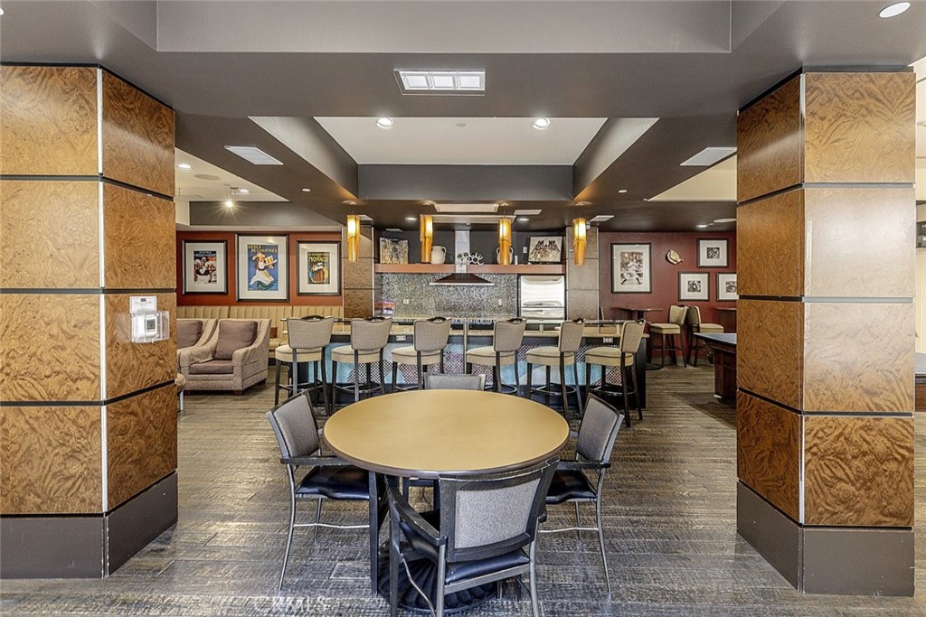 100 South Alameda Street, Unit 353 Los Angeles, CA 90012 - Photo 50 of 60 a living room with furniture a window and stainless steel appliances