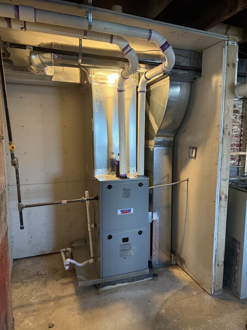 7115 South Peoria Street Chicago, IL 60621 - Photo 12 of 19 a room with lots of appliances