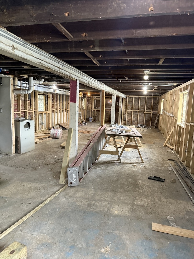 7115 South Peoria Street Chicago, IL 60621 - Photo 13 of 19 a view of a room with gym equipment