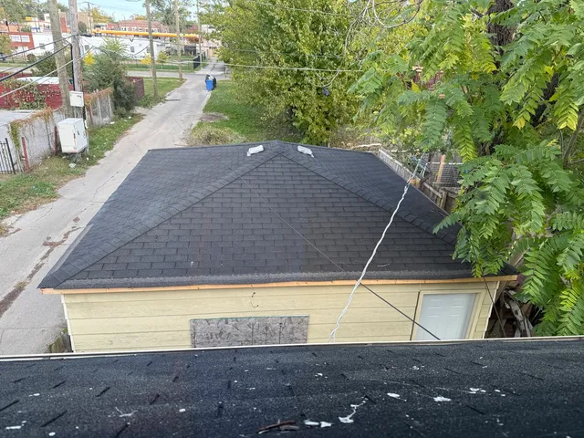 a view of a swimming pool with a yard