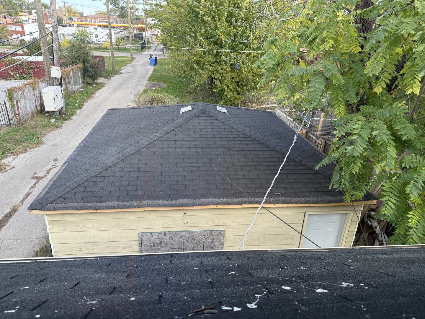 7115 South Peoria Street Chicago, IL 60621 - Photo 16 of 19 a view of a swimming pool with a yard