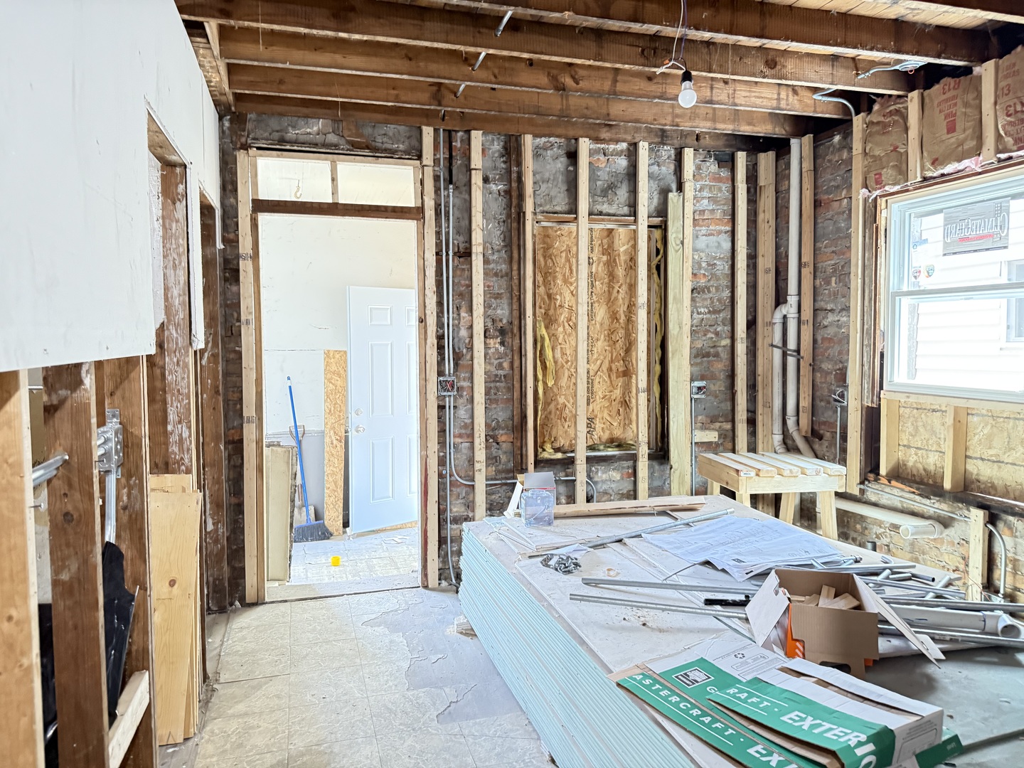 7115 South Peoria Street Chicago, IL 60621 - Photo 5 of 19 a living room with furniture and a window