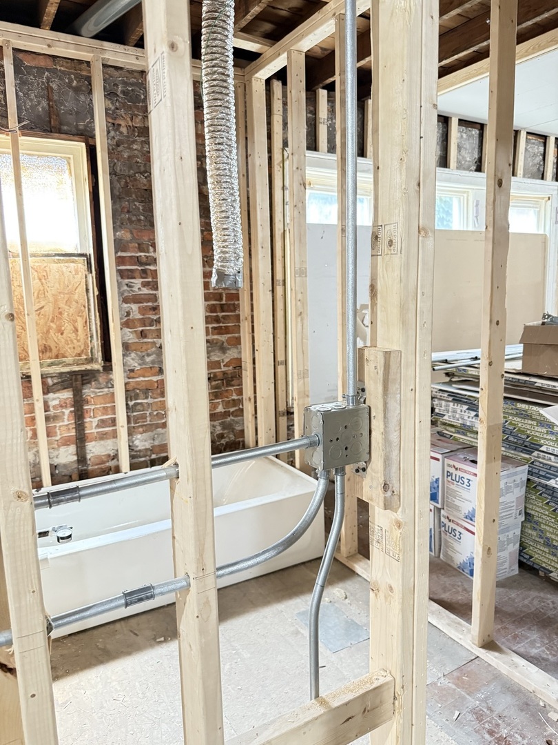 7115 South Peoria Street Chicago, IL 60621 - Photo 6 of 19 a bathroom with a tub and a view of living room
