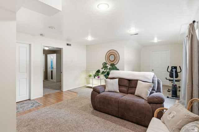 1101 Old Dairy Road Sandy, UT 84094 - Photo 22 of 36 Open-concept room featuring recessed lighting and wall-to-wall carpeting