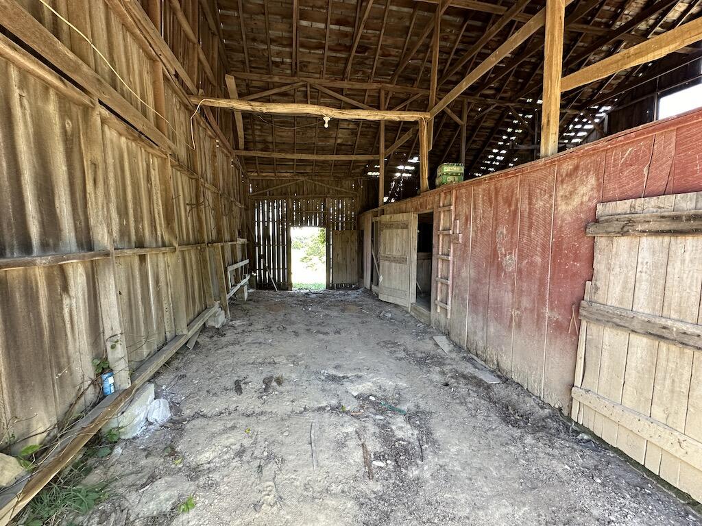 415 Thunderstruck Road Northeast Floyd, VA 24091 - Photo 25 of 37 a view of an empty room with wooden walls