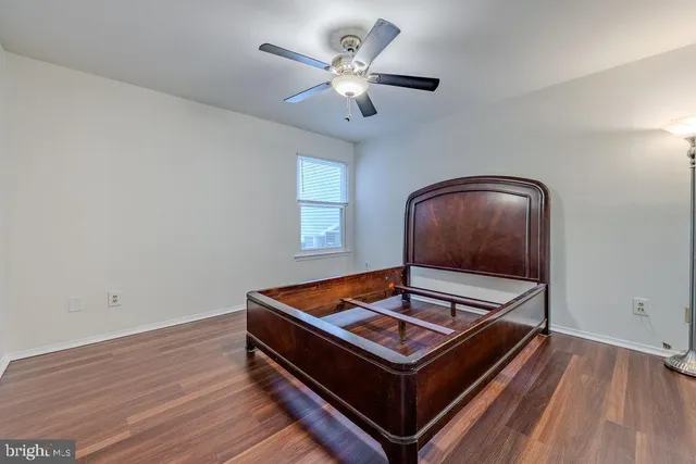 a view of workspace with wooden floor