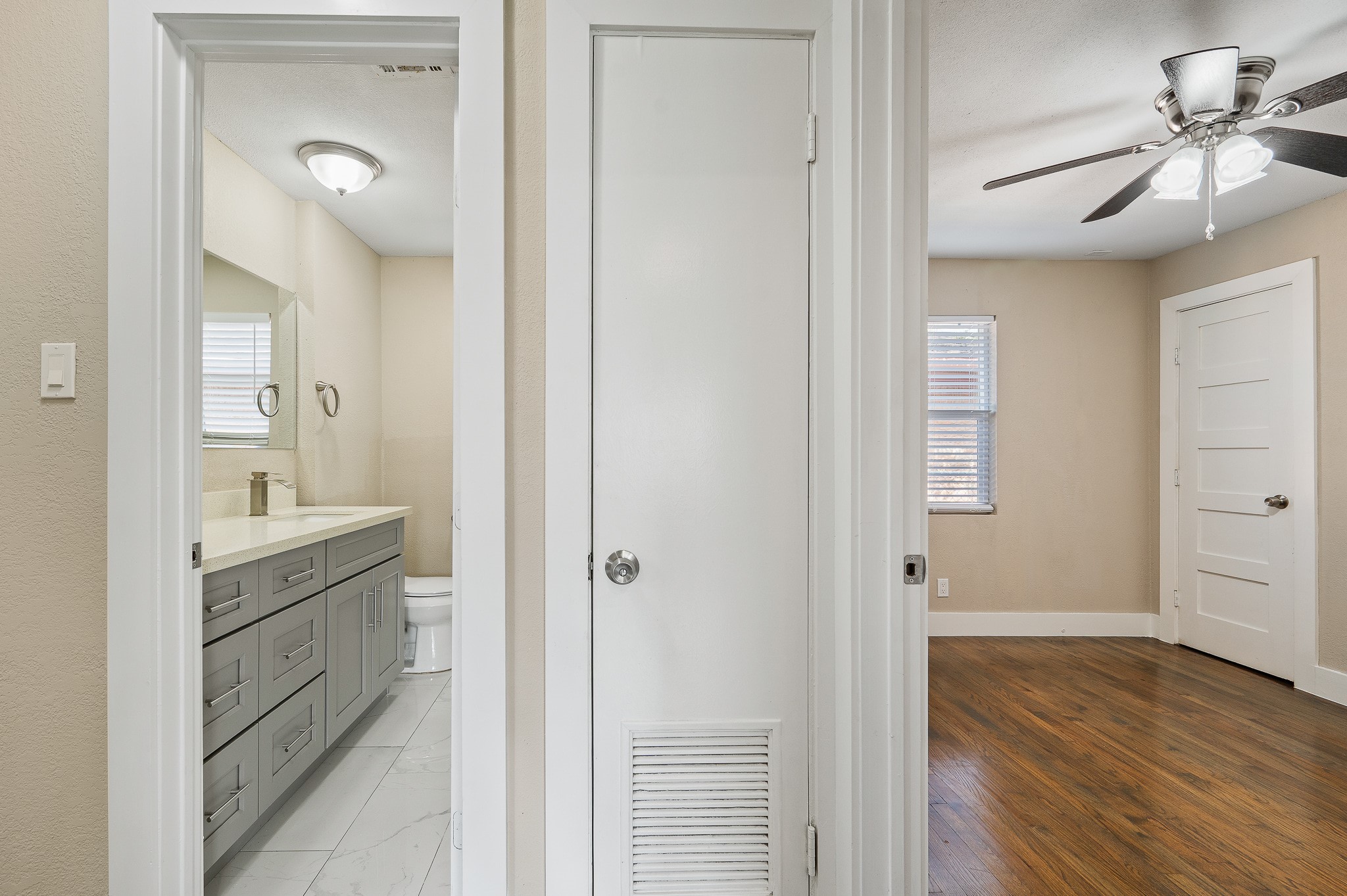 2222 Peppermill Road Houston, TX 77080 - Photo 18 of 38 a bathroom with a granite countertop sink mirror and vanity