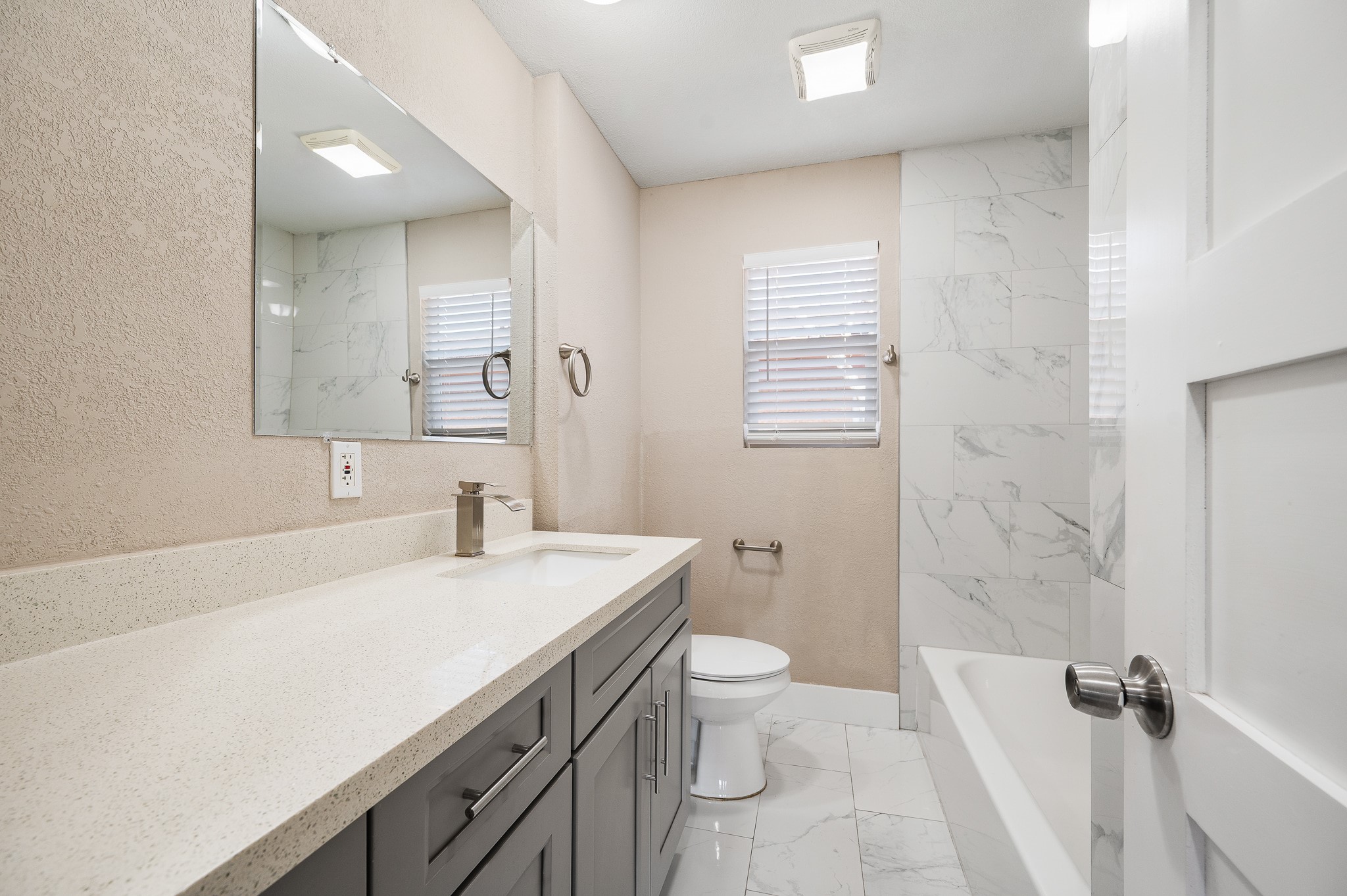 2222 Peppermill Road Houston, TX 77080 - Photo 19 of 38 a bathroom with a sink a toilet and shower