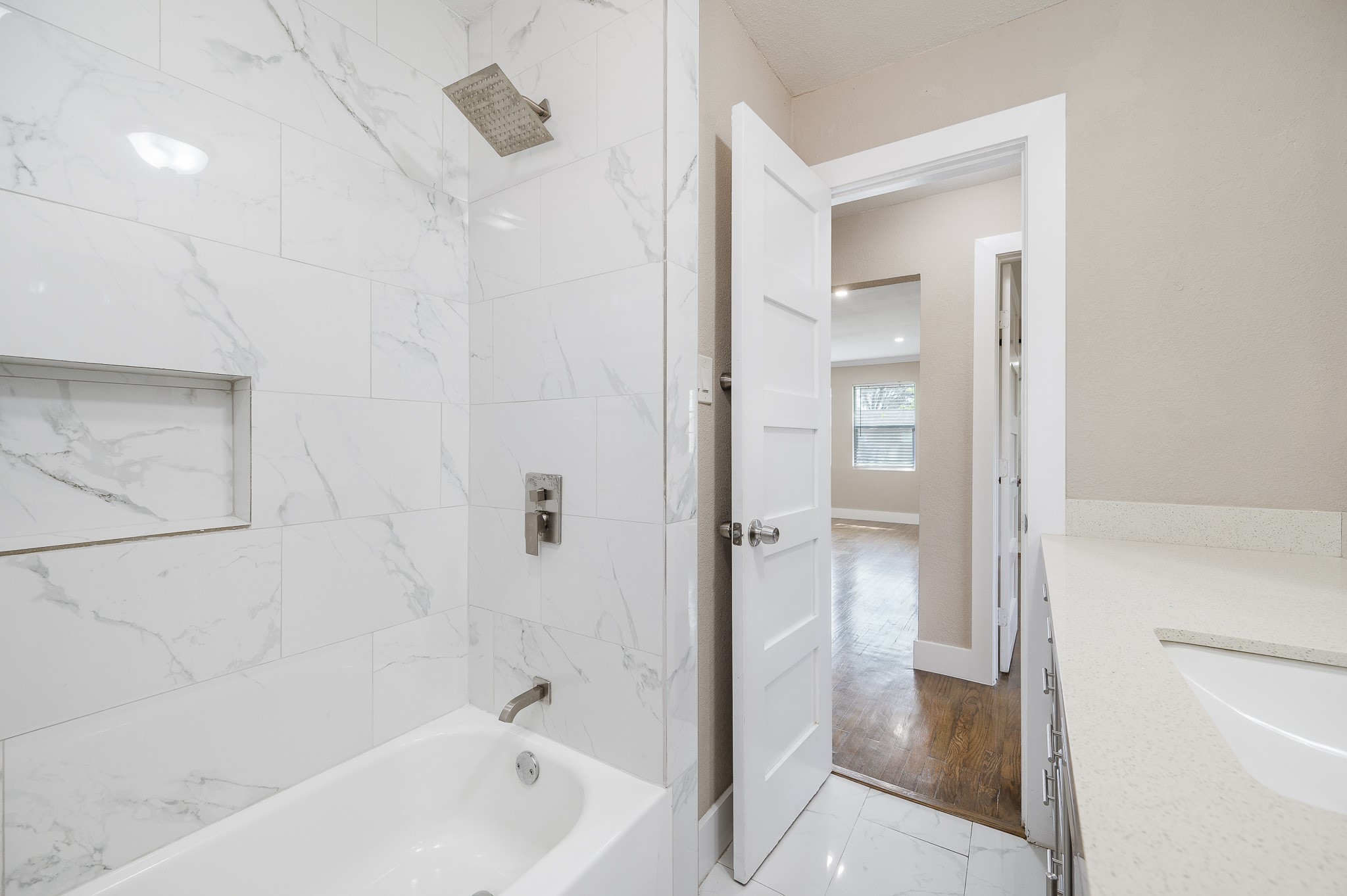 2222 Peppermill Road Houston, TX 77080 - Photo 20 of 38 a bathroom with a bathtub and shower