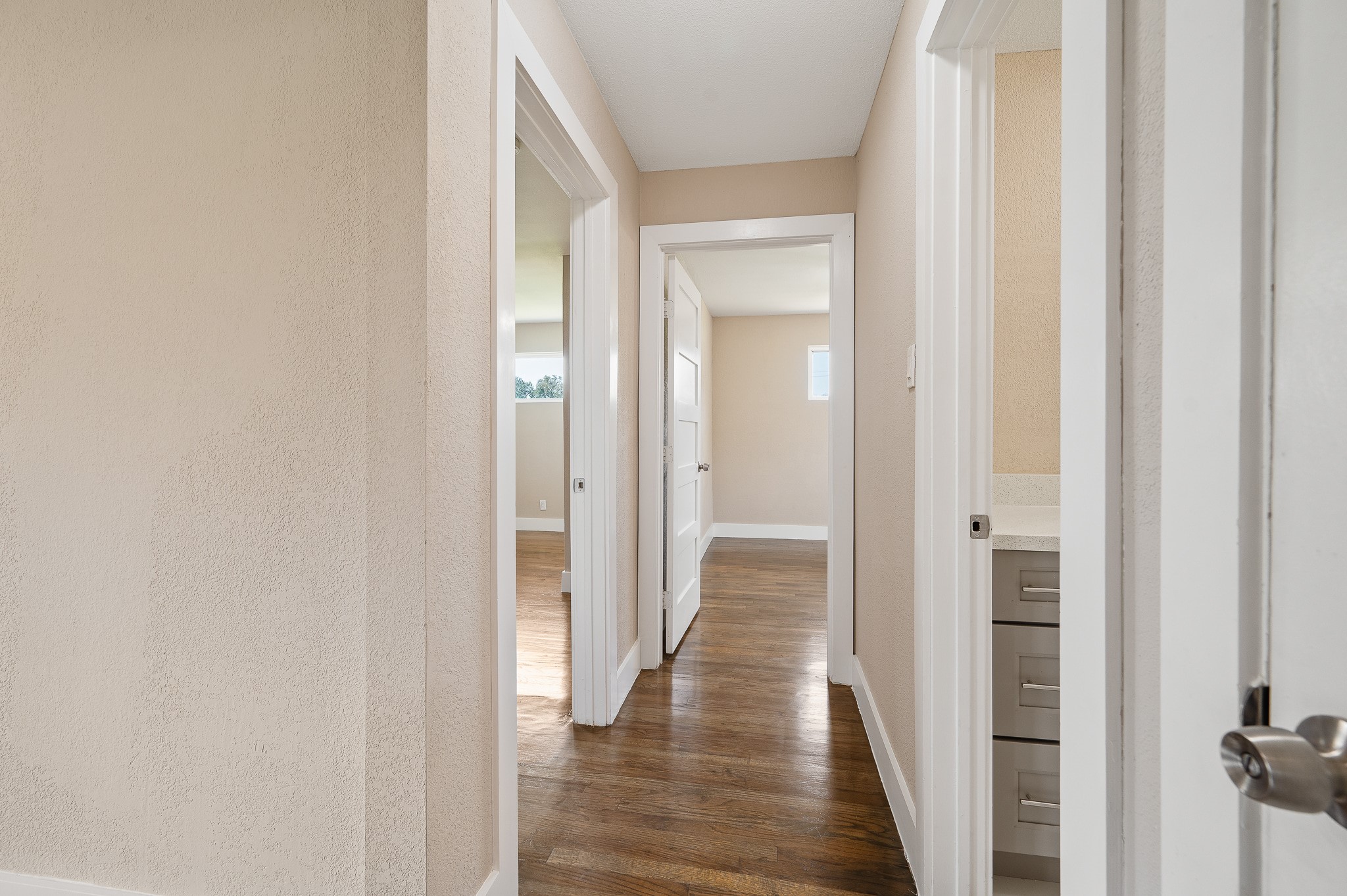 2222 Peppermill Road Houston, TX 77080 - Photo 24 of 38 a view of a hallway with wooden floor