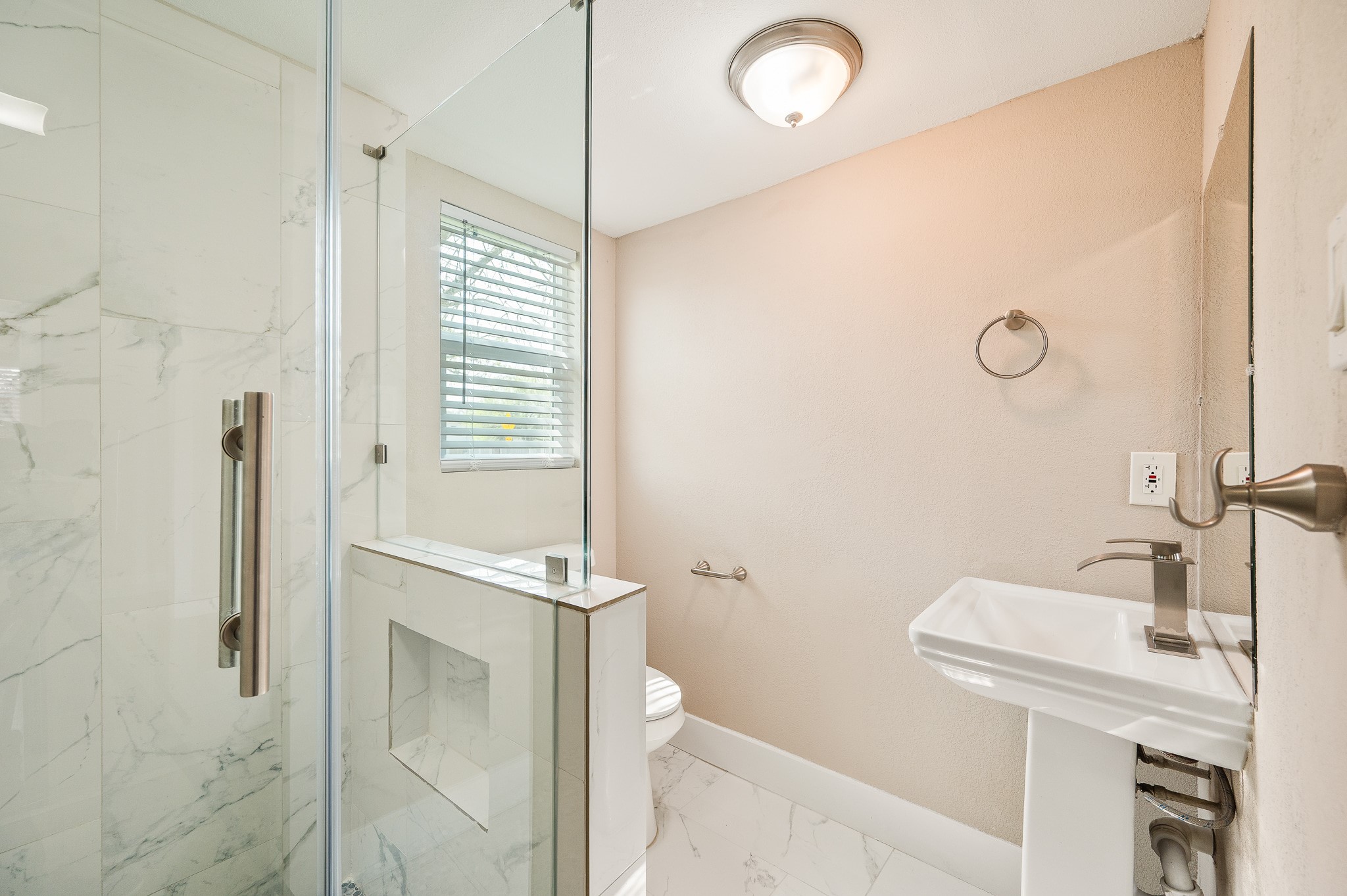 2222 Peppermill Road Houston, TX 77080 - Photo 30 of 38 a bathroom with a sink a toilet and shower