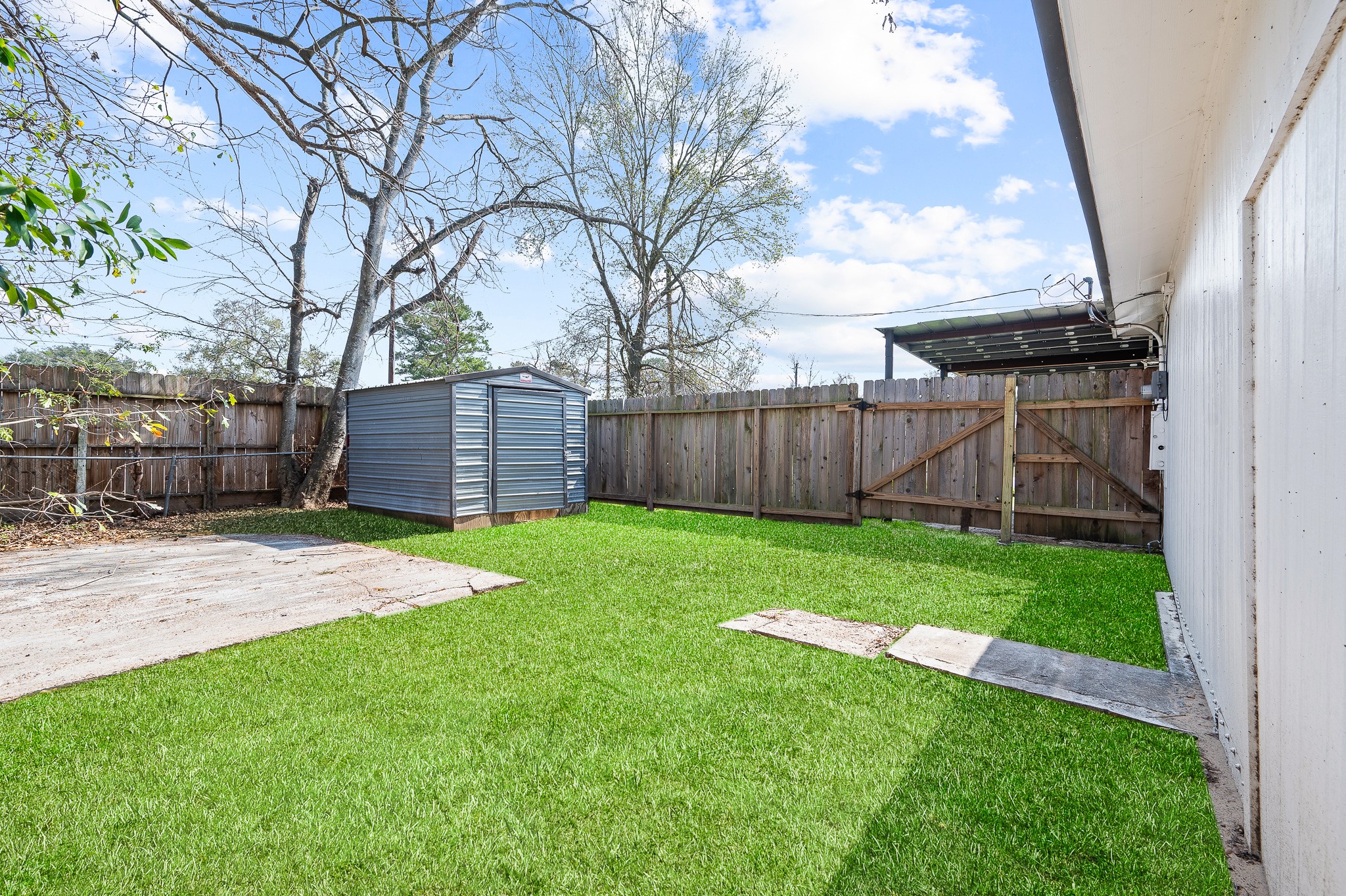 2222 Peppermill Road Houston, TX 77080 - Photo 37 of 38 a view of a backyard with wooden fence