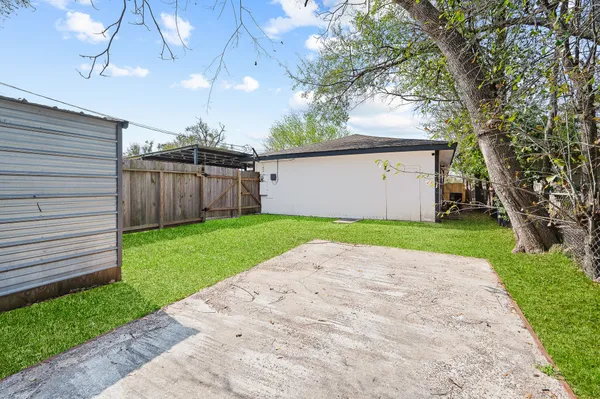 a view of a backyard with a garden