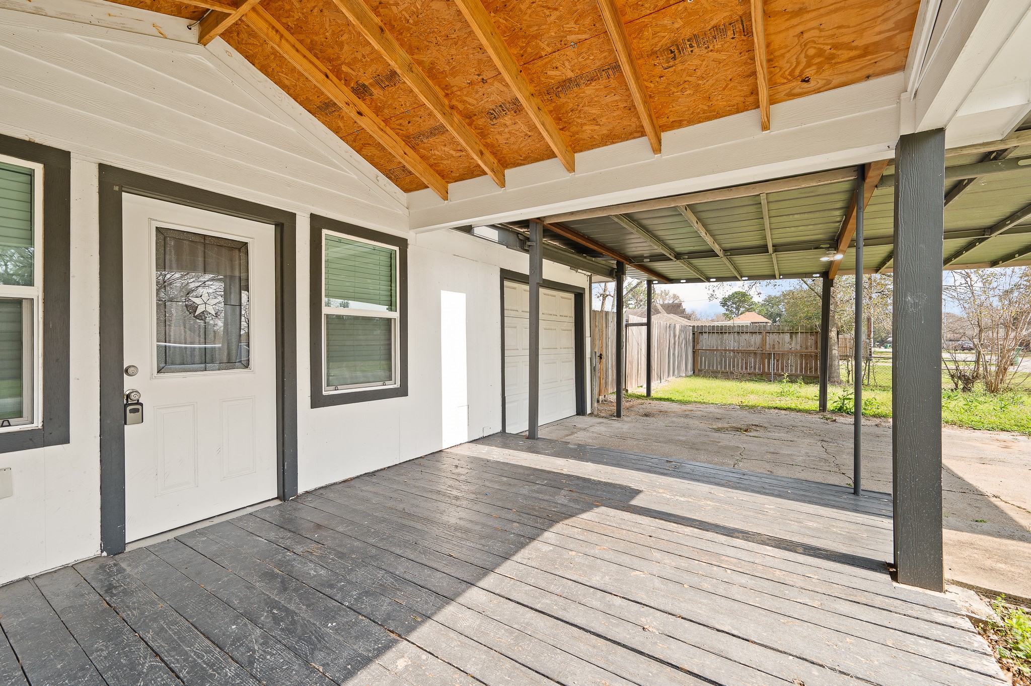2222 Peppermill Road Houston, TX 77080 - Photo 5 of 38 a view of a room with wooden floor and windows