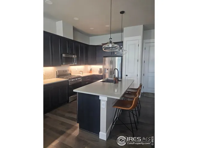 a living room with furniture fireplace and flat screen tv