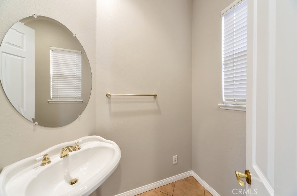 3655 Cll Joaquin Calabasas, CA 91302 - Photo 5 of 15 a bathroom with a sink and a mirror
