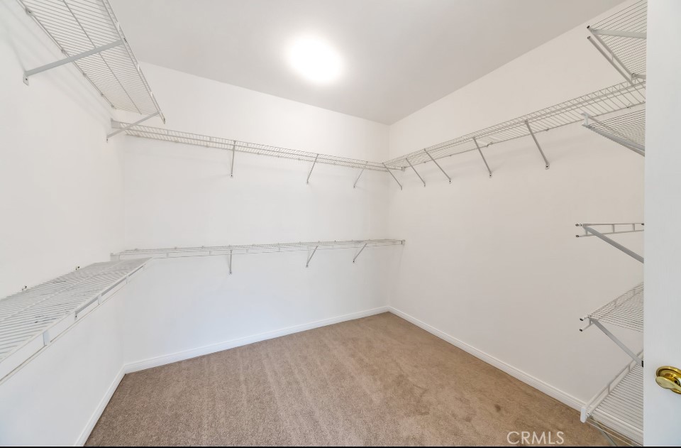 3655 Cll Joaquin Calabasas, CA 91302 - Photo 8 of 15 a view of a room with racks on the wall