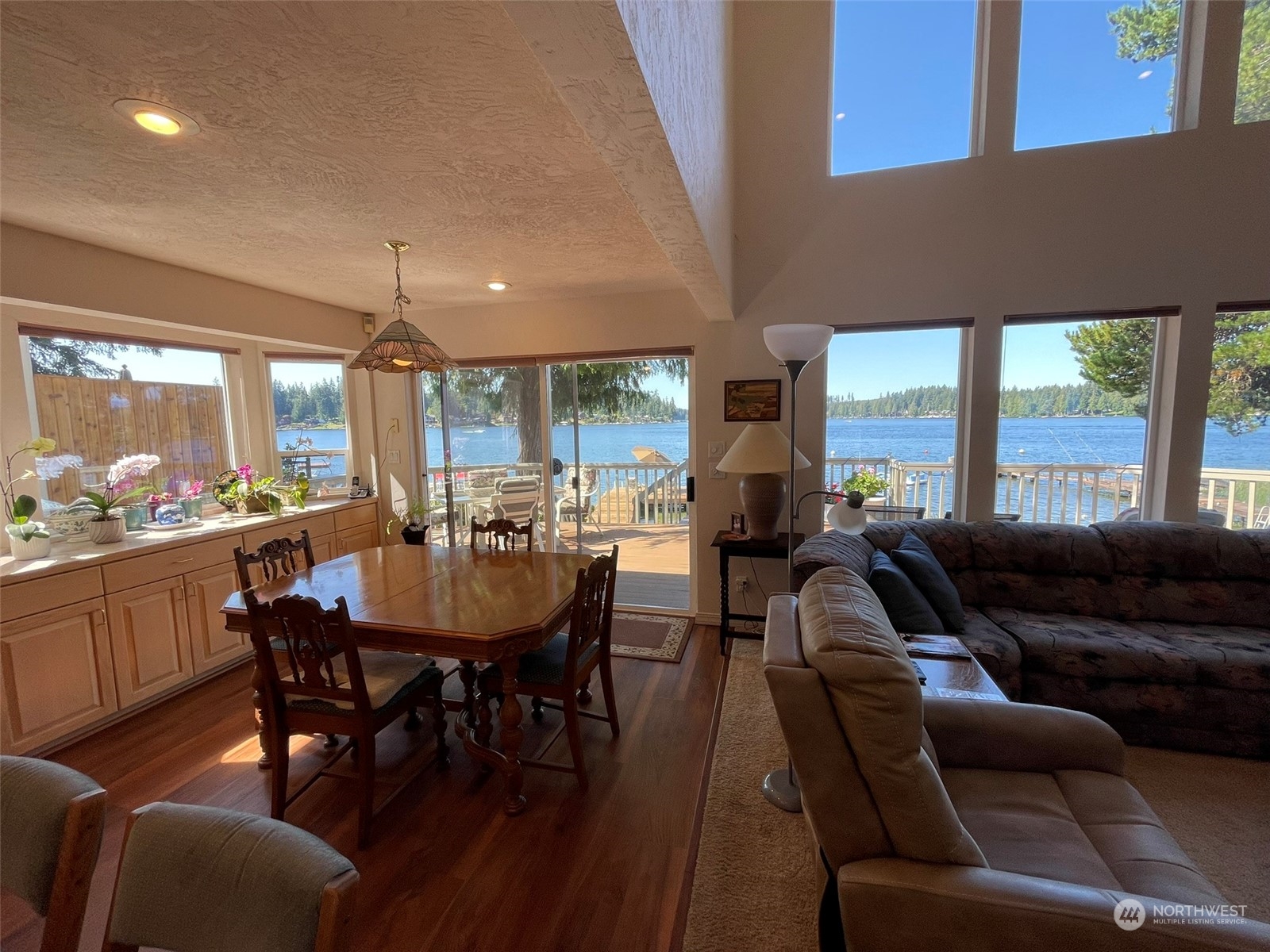 10 Shore Court Grapeview, WA 98546 - Photo 12 of 39 a view of a dining room with furniture window and outside view