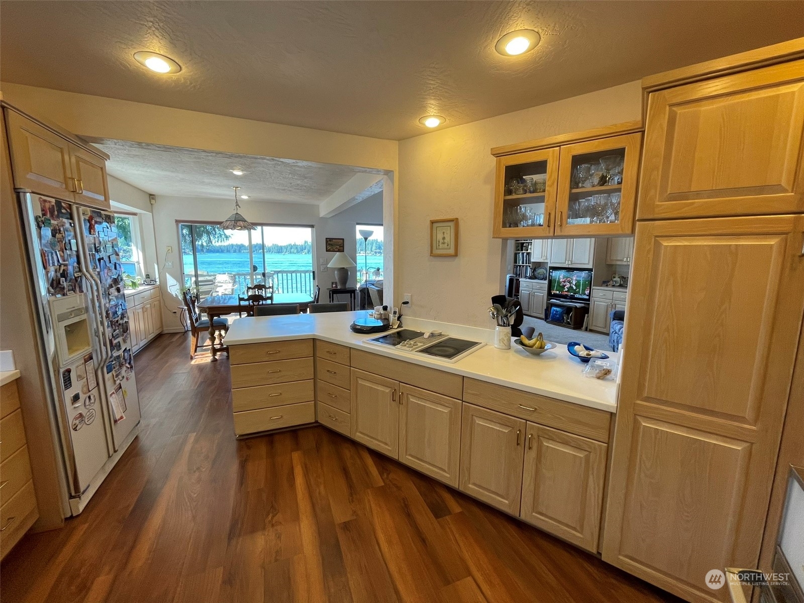10 Shore Court Grapeview, WA 98546 - Photo 15 of 39 a large kitchen with a lot of counter space and wooden floor