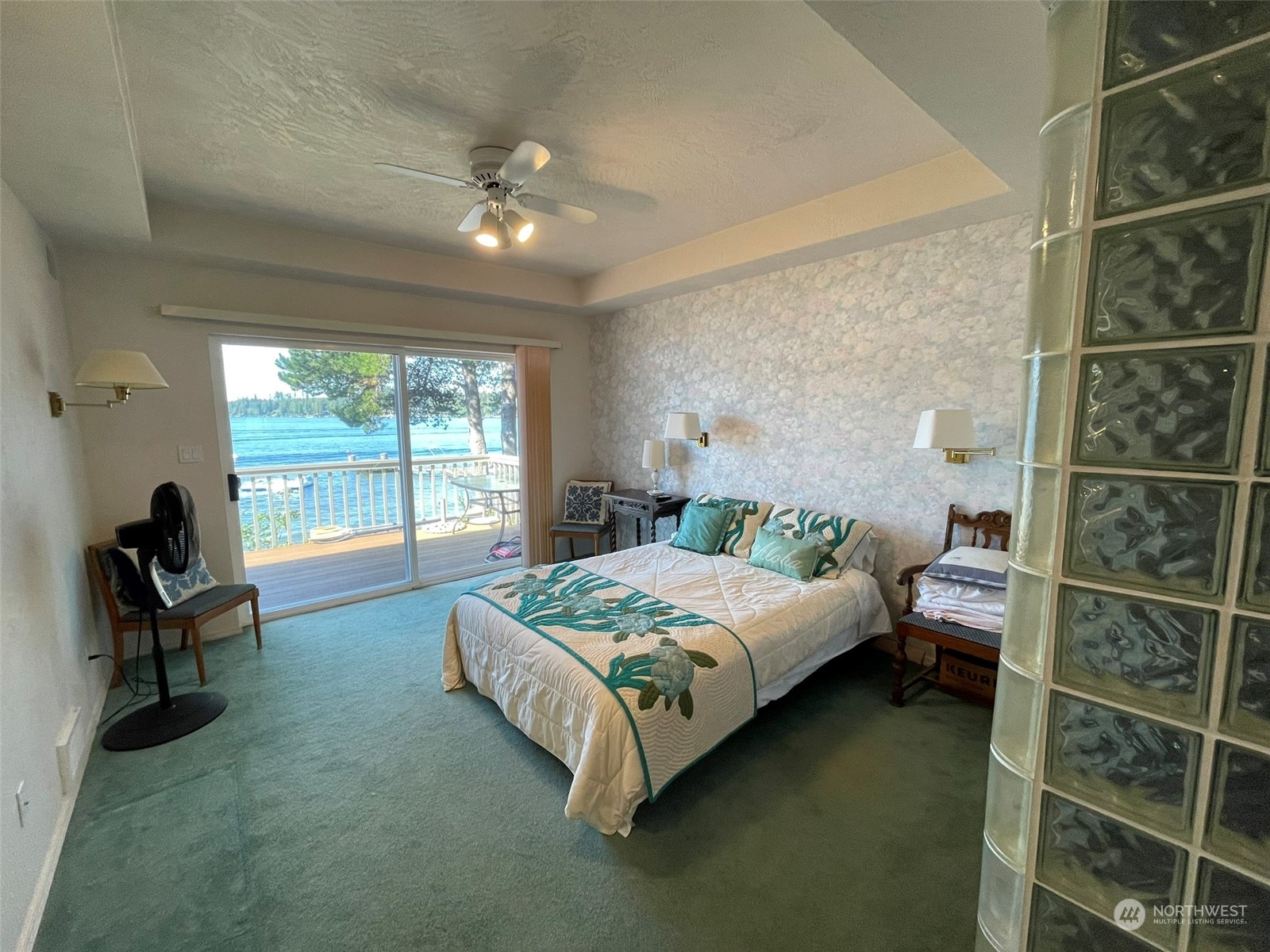 10 Shore Court Grapeview, WA 98546 - Photo 17 of 39 a bedroom with a bed and a large window