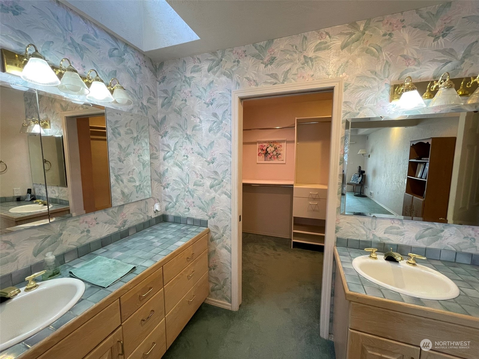 10 Shore Court Grapeview, WA 98546 - Photo 19 of 39 a bathroom with a granite countertop sink and a mirror