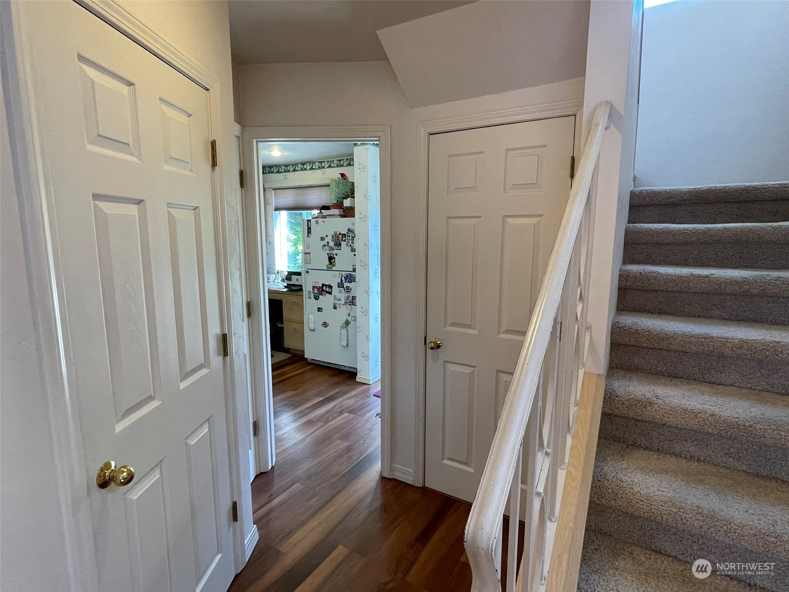 10 Shore Court Grapeview, WA 98546 - Photo 25 of 39 a view of a hallway with wooden floor and staircase