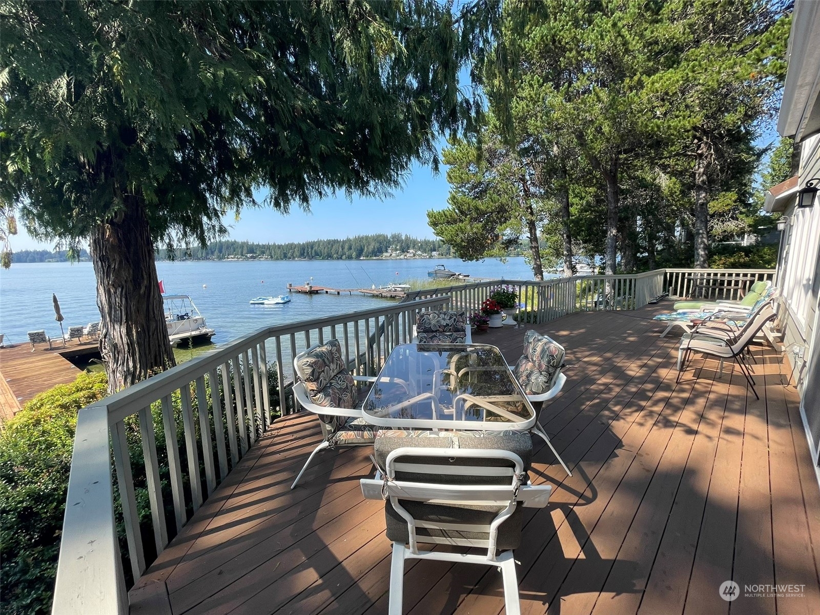 10 Shore Court Grapeview, WA 98546 - Photo 5 of 39 a view of balcony with wooden floor and outdoor seating