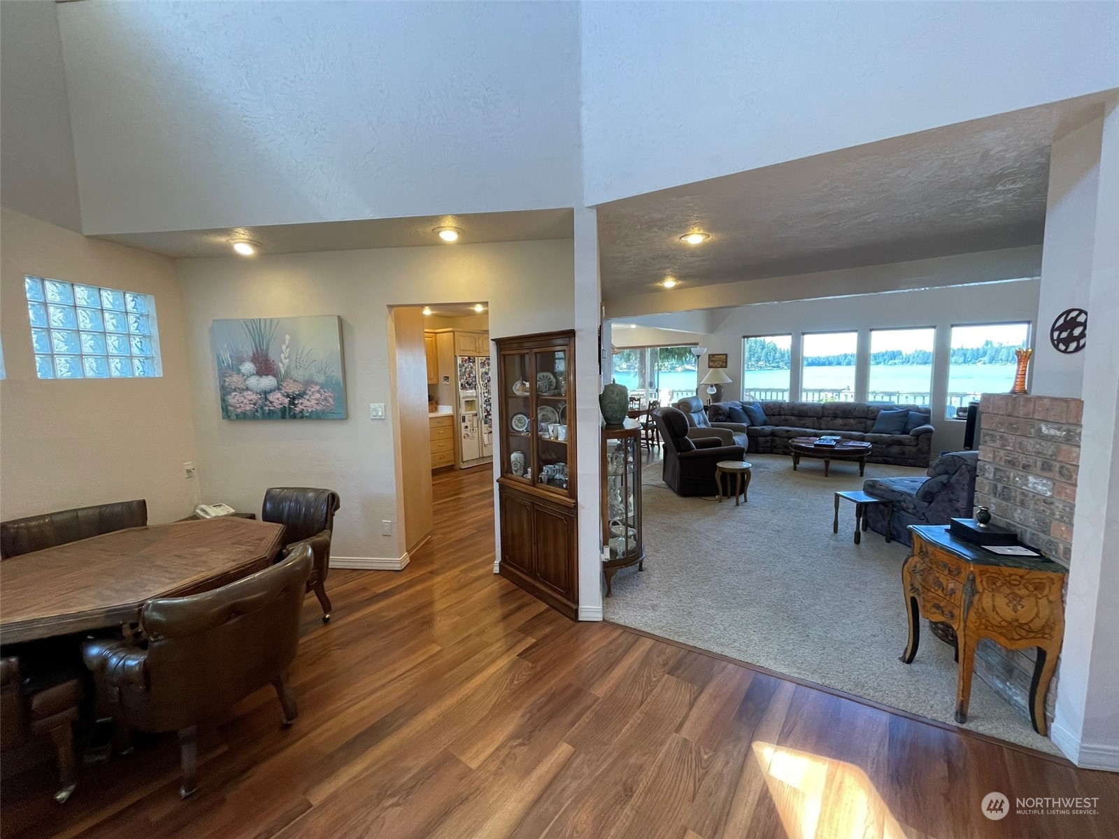 10 Shore Court Grapeview, WA 98546 - Photo 10 of 39 a living room with furniture and a flat screen tv