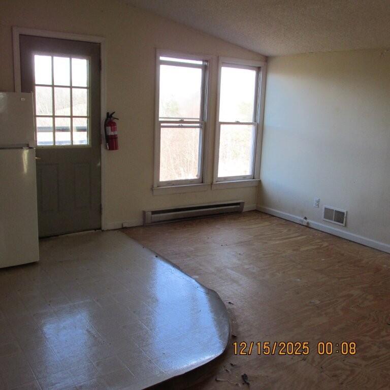 465 McMoon Lane Stuart, VA 24171 - Photo 13 of 16 an empty room with windows
