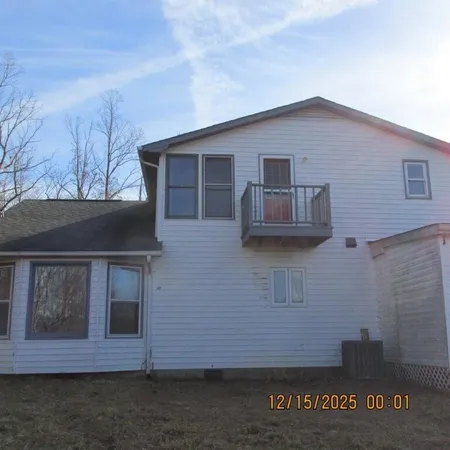 a front view of a house with a garage