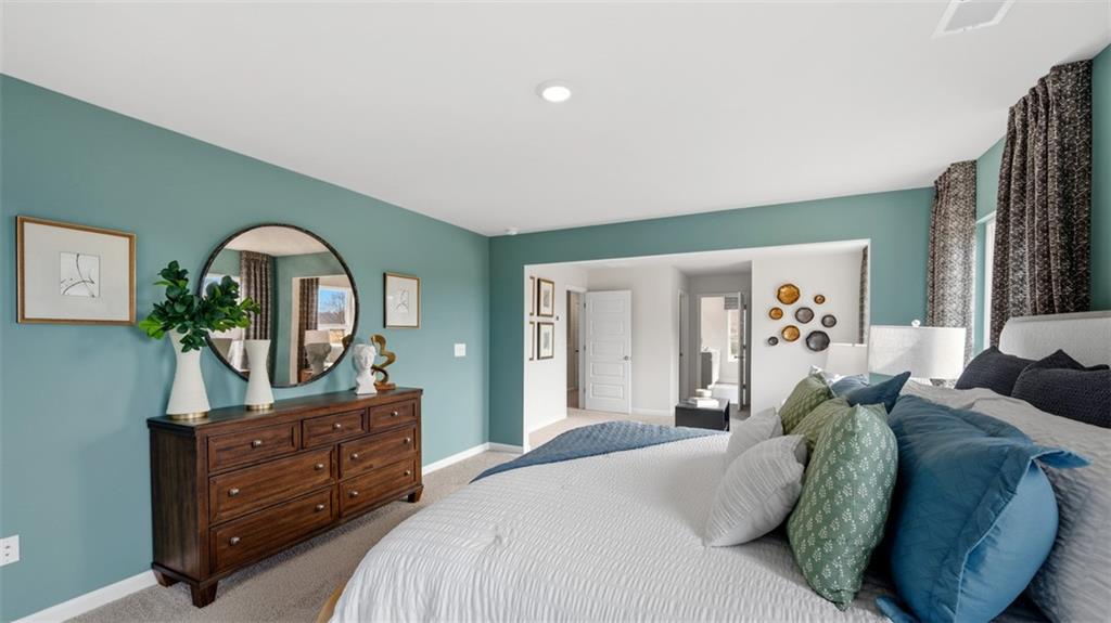460 Bullock Pass Jefferson, GA 30549 - Photo 28 of 60 a bedroom with a bed and a dresser