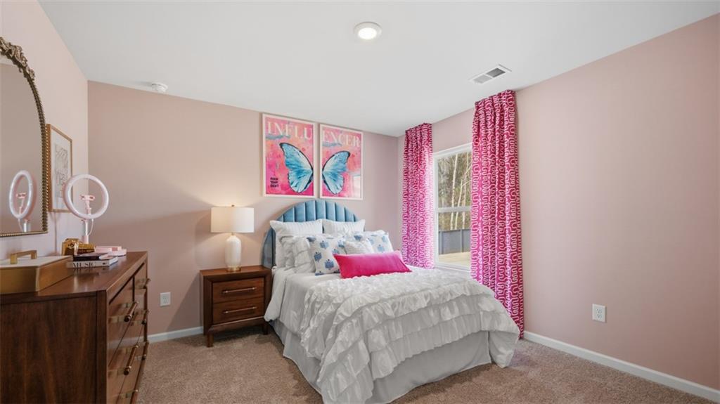 460 Bullock Pass Jefferson, GA 30549 - Photo 40 of 60 a bed room with a bed and a desk