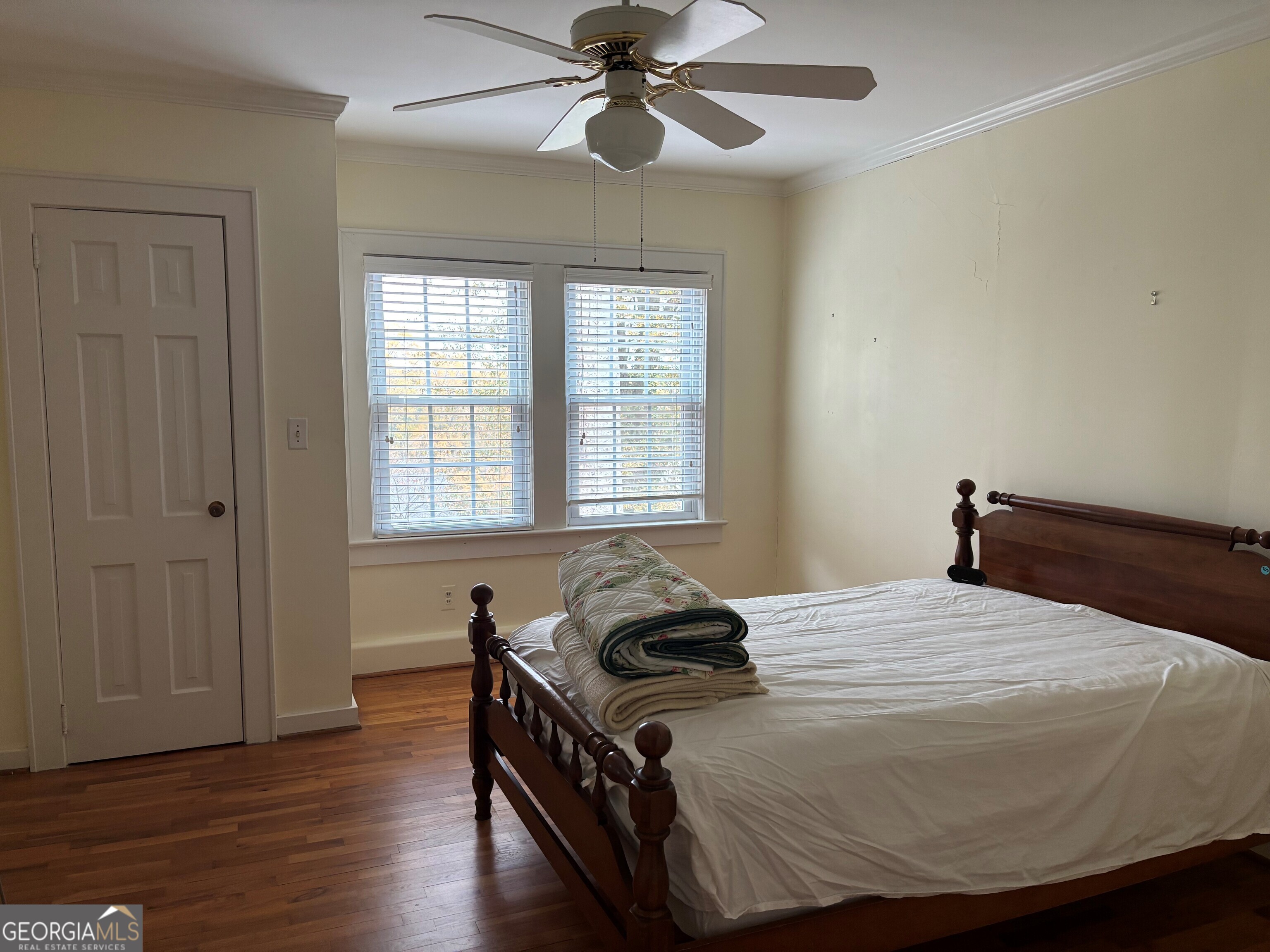 9 Eastridge Court Rome, GA 30161 - Photo 23 of 41 a bedroom with a bed and wooden floor