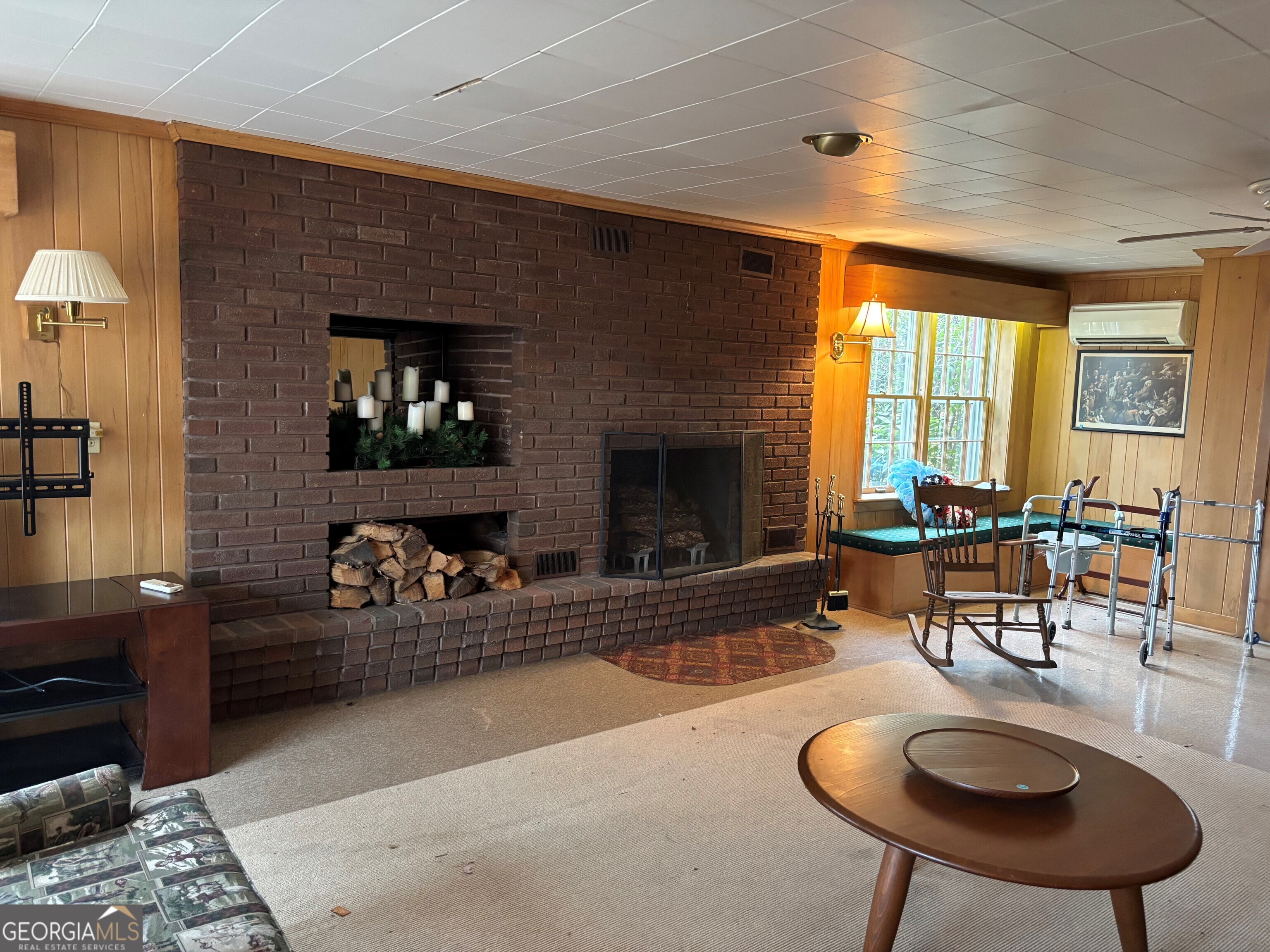 9 Eastridge Court Rome, GA 30161 - Photo 27 of 38 a living room with furniture and a fireplace