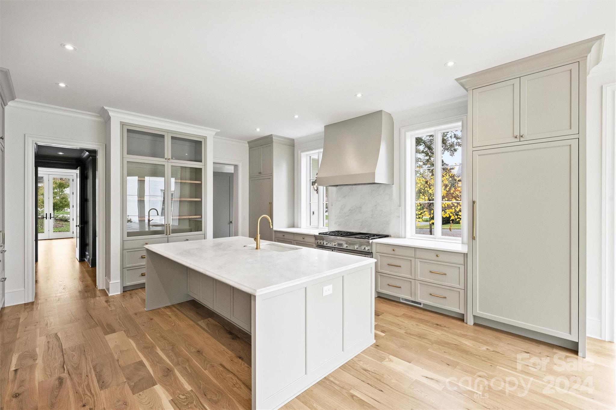 1601 Coventry Road Charlotte, NC 28211 - Photo 11 of 40 a kitchen that has a sink a stove and a refrigerator