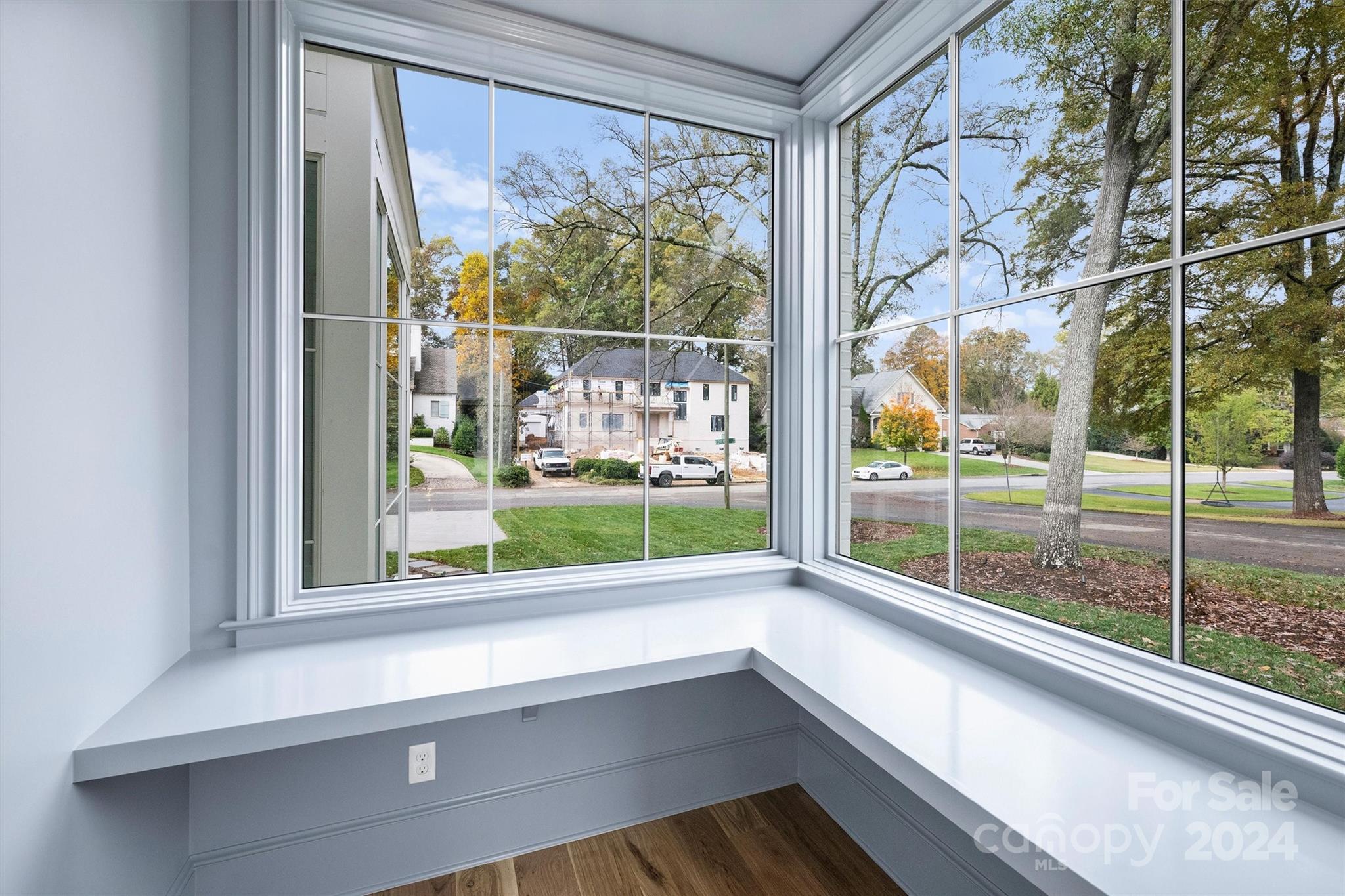 1601 Coventry Road Charlotte, NC 28211 - Photo 16 of 40 a view of a glass door with a tree