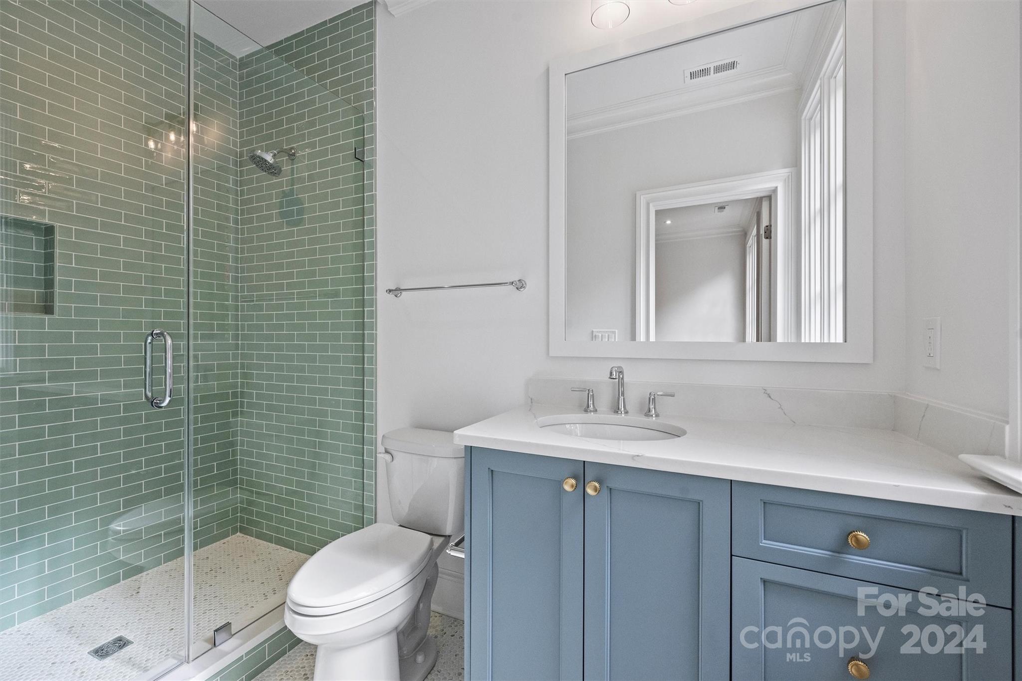 1601 Coventry Road Charlotte, NC 28211 - Photo 23 of 40 a bathroom with a sink toilet and shower