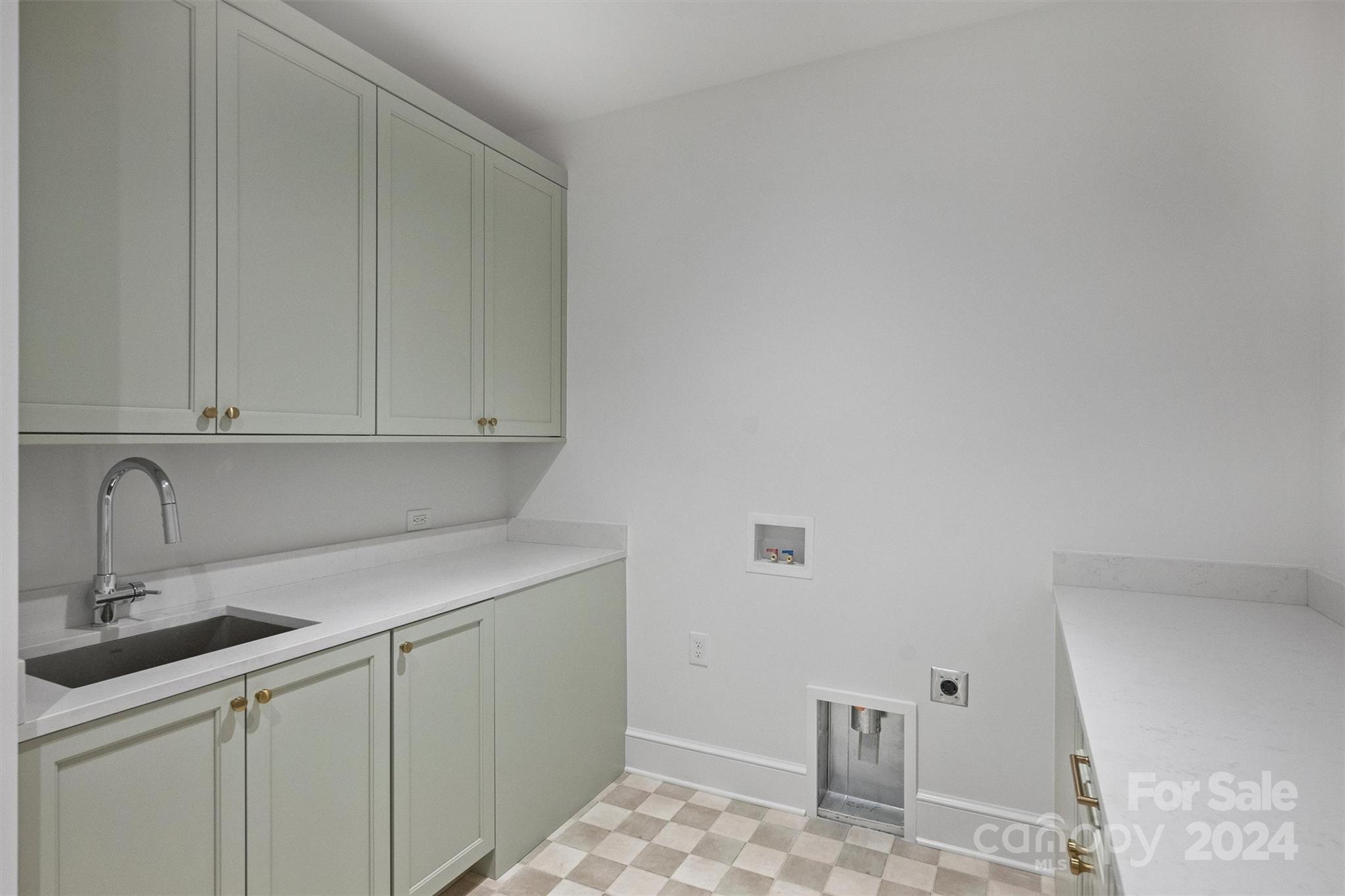 1601 Coventry Road Charlotte, NC 28211 - Photo 26 of 40 a kitchen with cabinets appliances and a sink