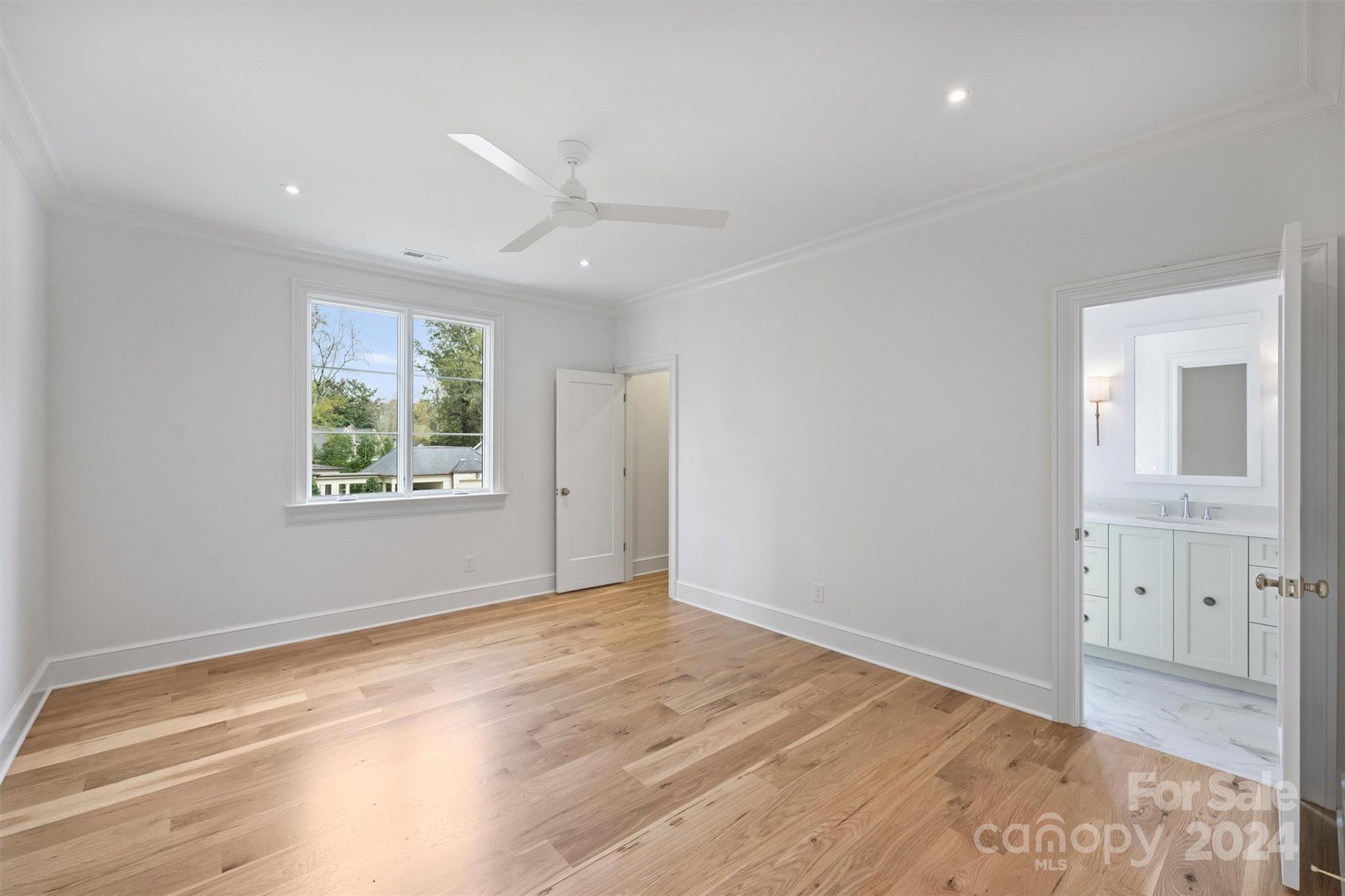 1601 Coventry Road Charlotte, NC 28211 - Photo 27 of 40 an empty room with wooden floor and windows