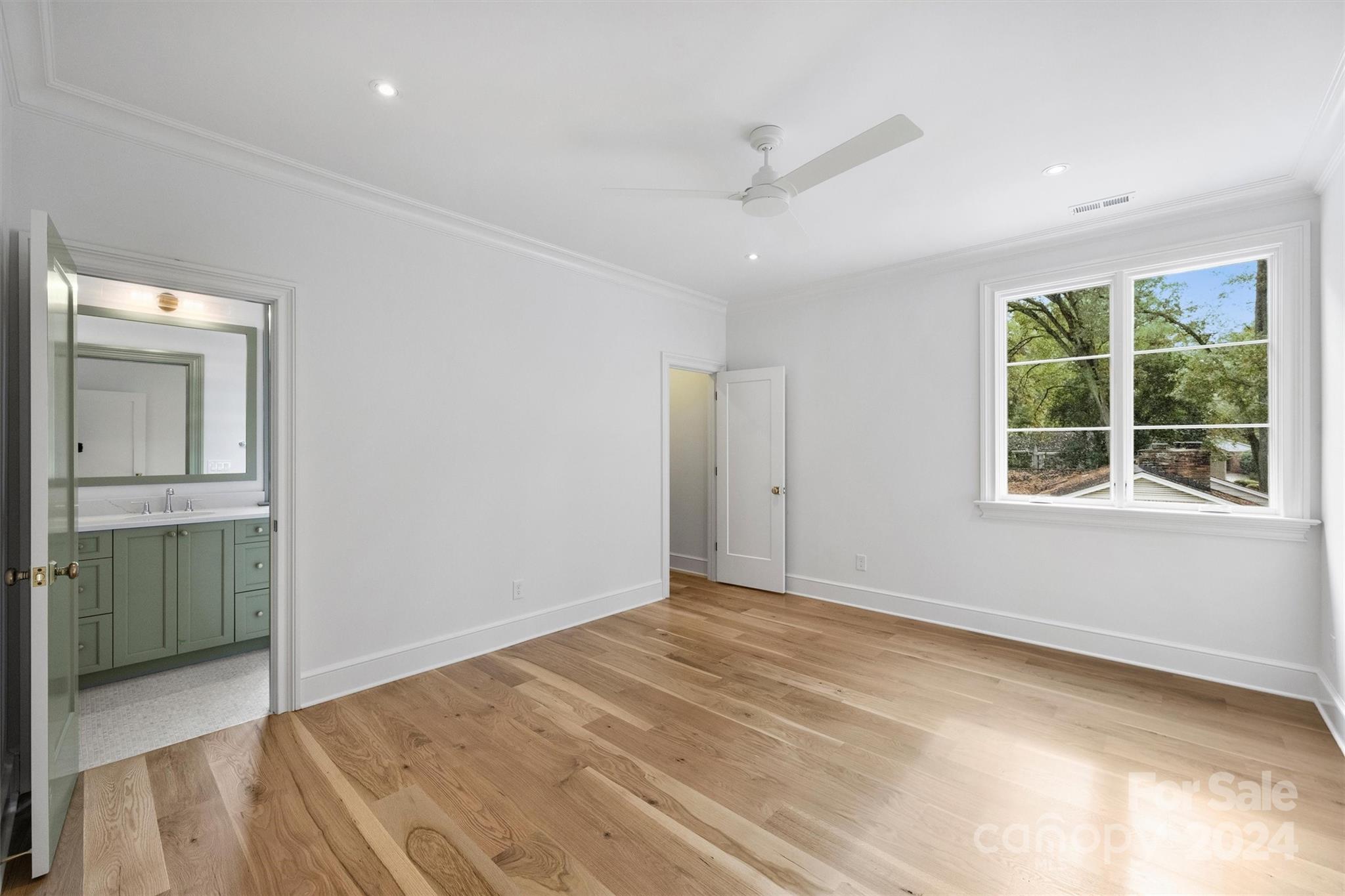 1601 Coventry Road Charlotte, NC 28211 - Photo 29 of 40 an empty room with windows and closet