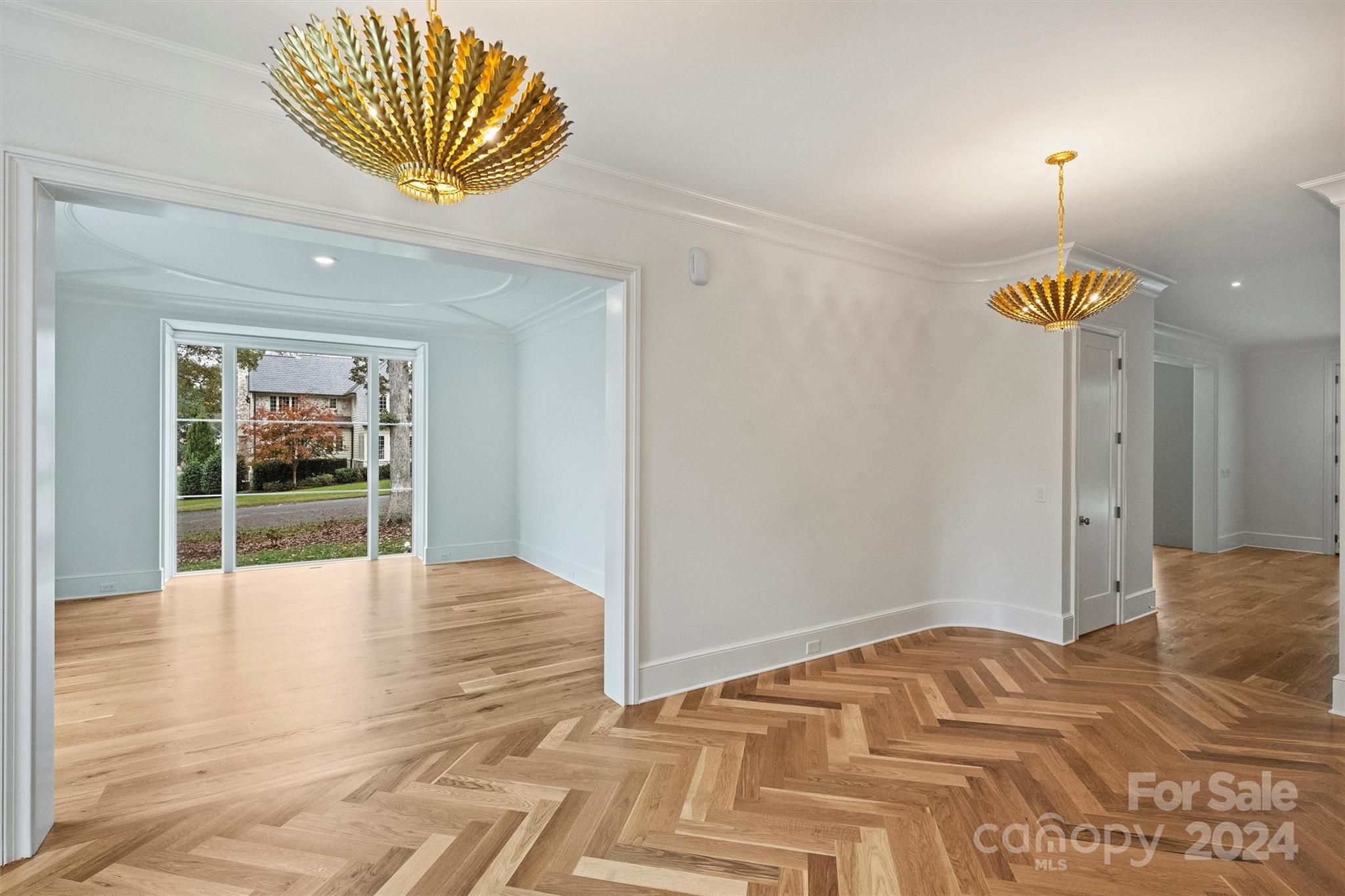 1601 Coventry Road Charlotte, NC 28211 - Photo 6 of 40 a view of empty room with a window and chandelier