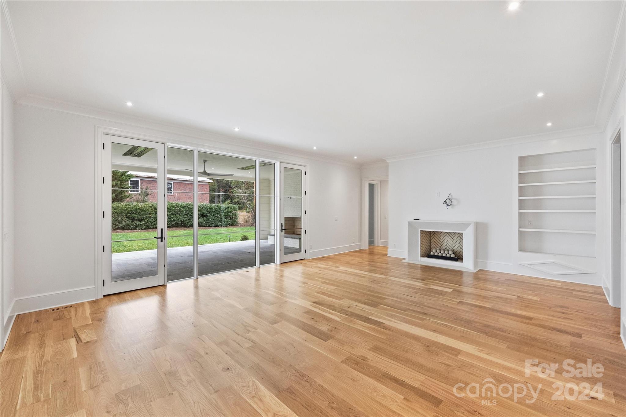 1601 Coventry Road Charlotte, NC 28211 - Photo 8 of 40 a view of an empty room with glass door